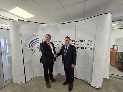 Dr. Glenn Agung Hole with the Rector at Mother Teresa University in Skopje