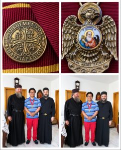 Dr. Glenn Agung Hole receiving the Medal of the Ecumenical Patriarchate at the Monastery of Saint John the Theologian, Patmos