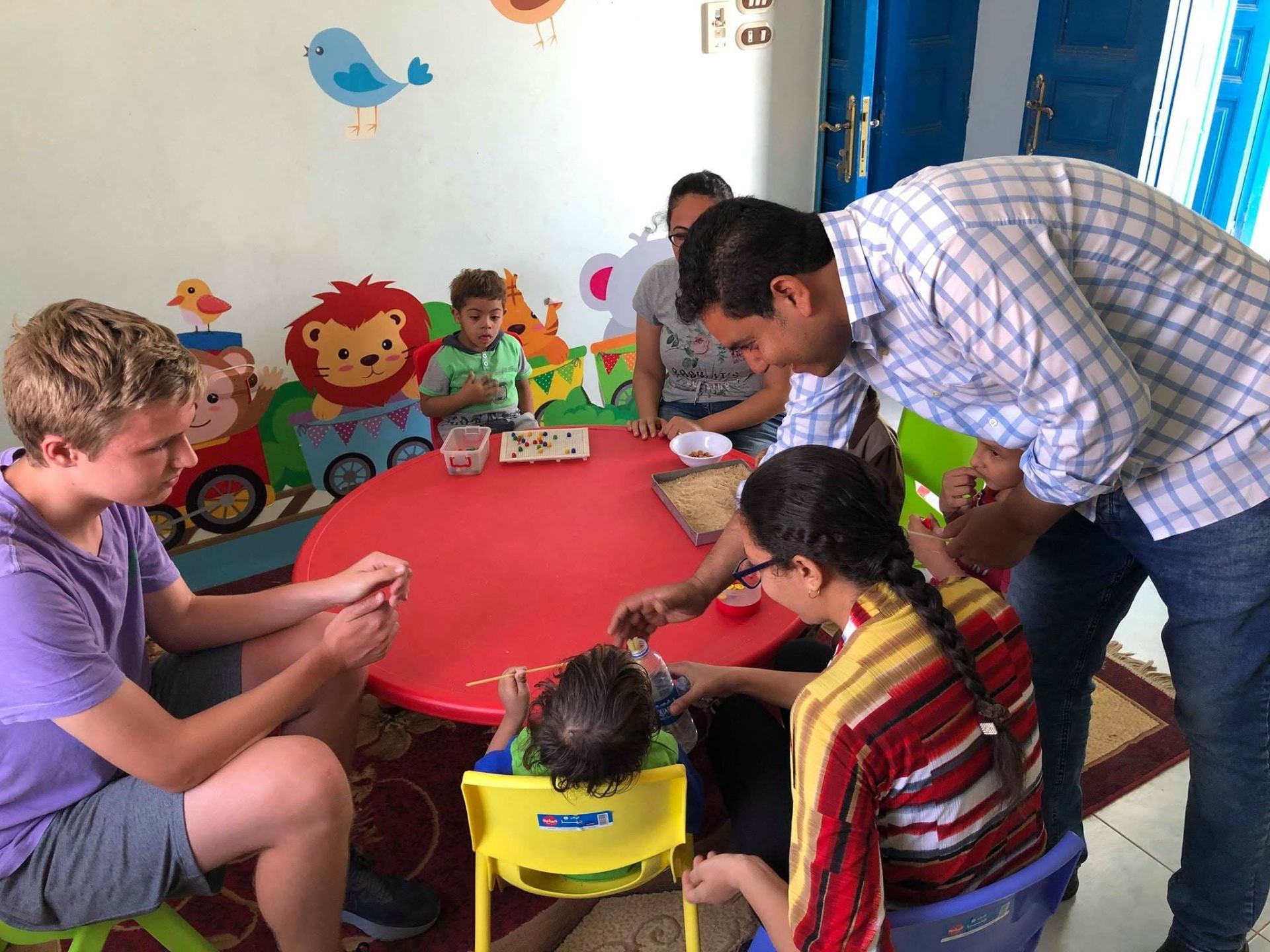 Group learning activity with children and staff at the Kari Center in Egypt