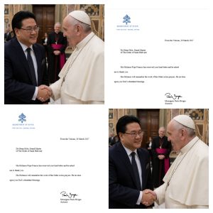 Dr. Glenn Agung Hole with Pope Francis and Papal Blessing documents from the Vatican, 20 March 2017